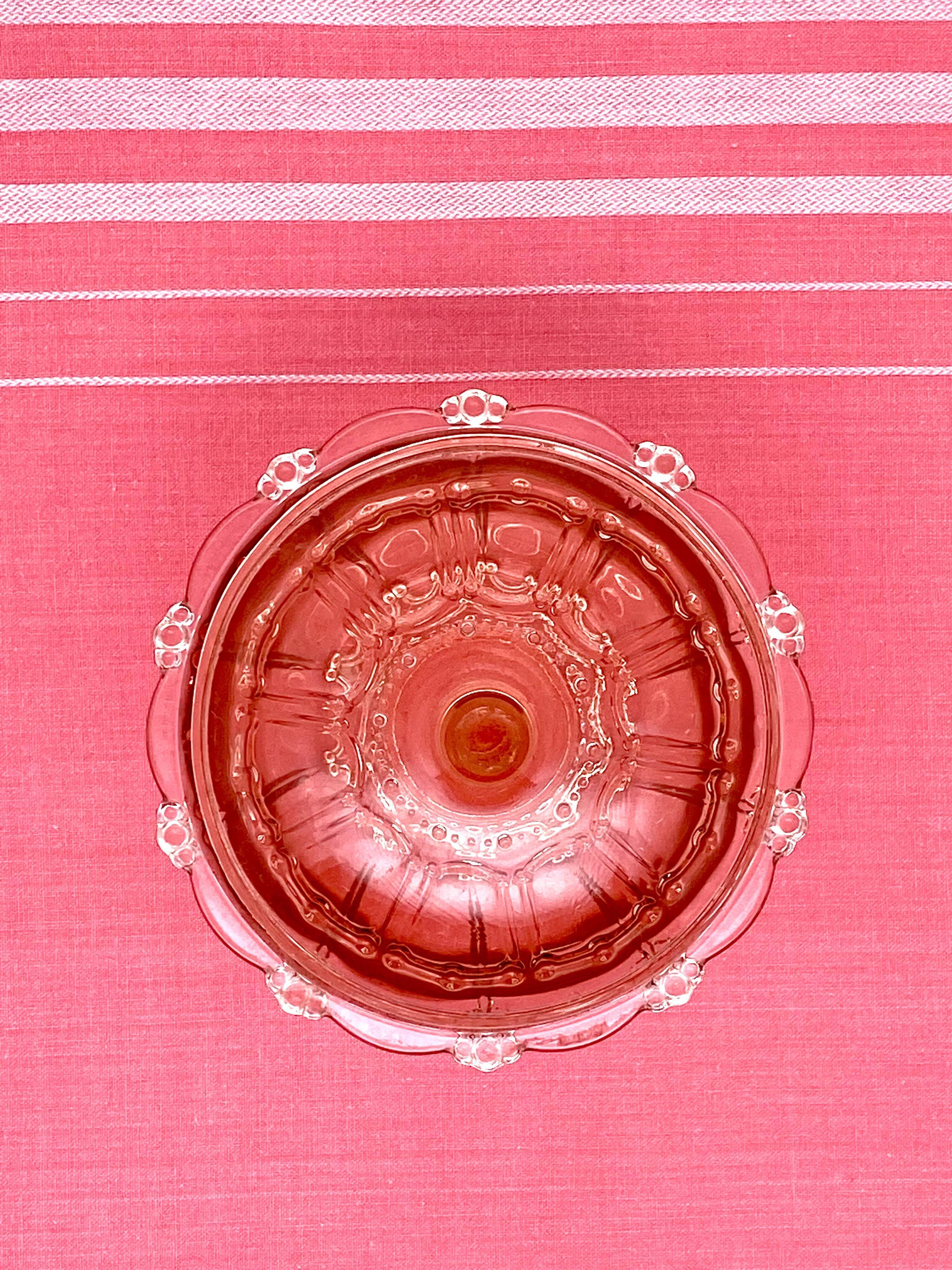 Sugar pot in worked pink glass