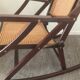 Folding wooden rocking chair and cannage from the 70s