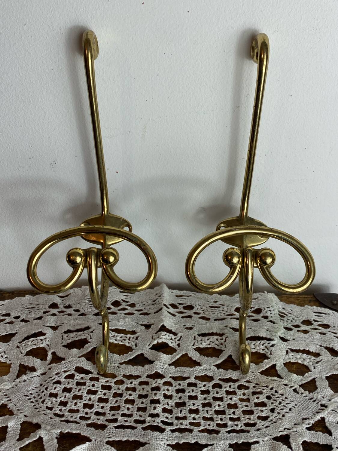 Pair of brass hooks