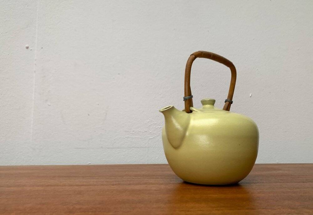 Mid-century ceramic teapot with bamboo handle, 1960s.