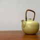 Mid-century ceramic teapot with bamboo handle, 1960s.