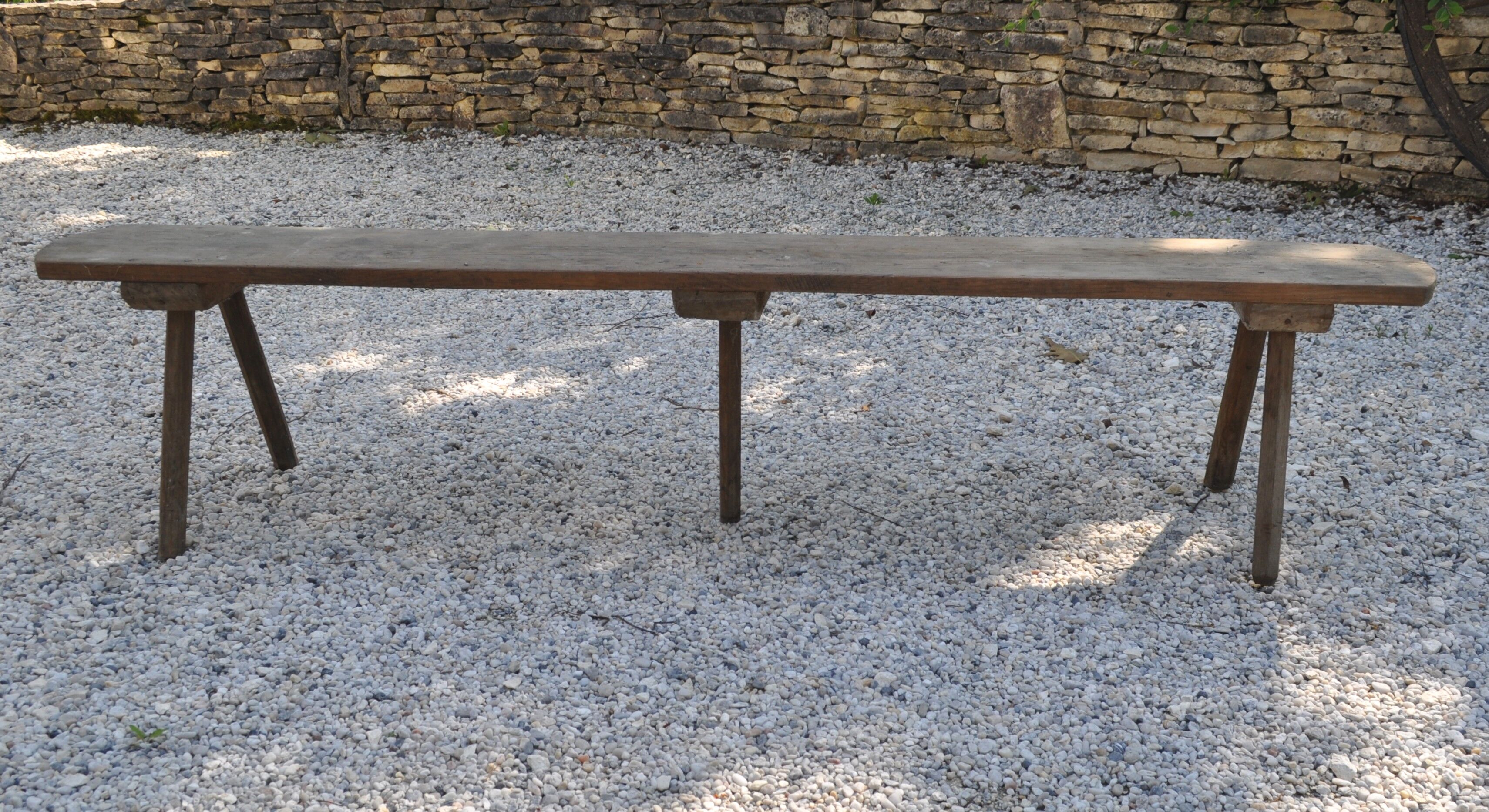 Rustic bench with central foot