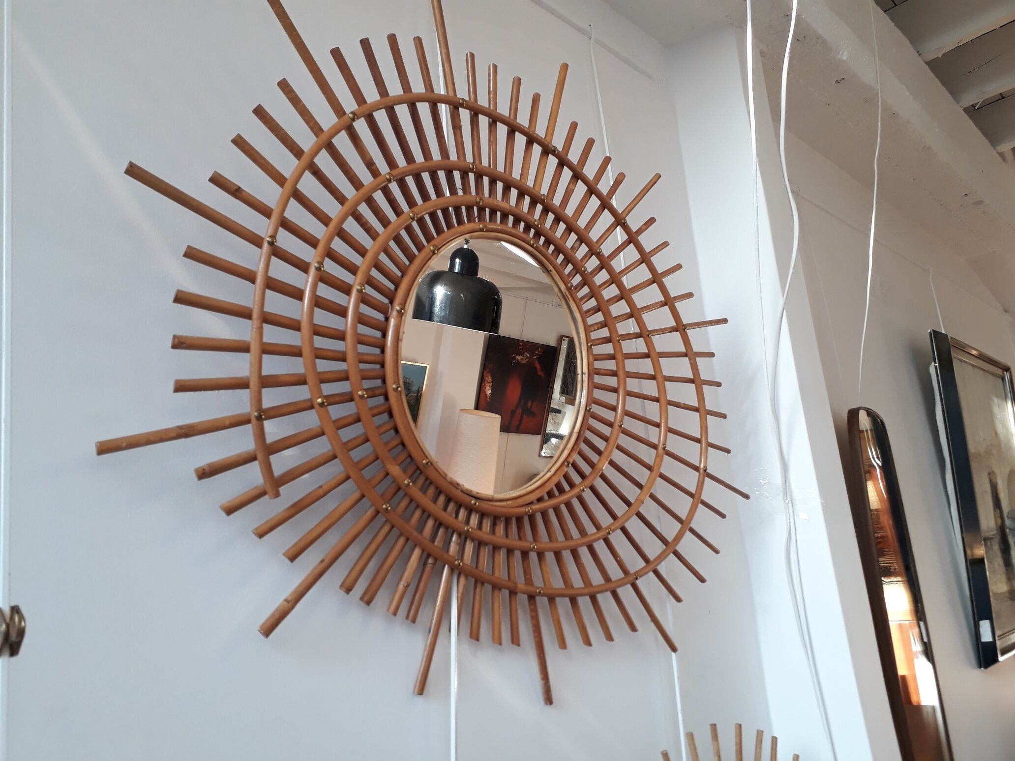Mirror comet in rattan