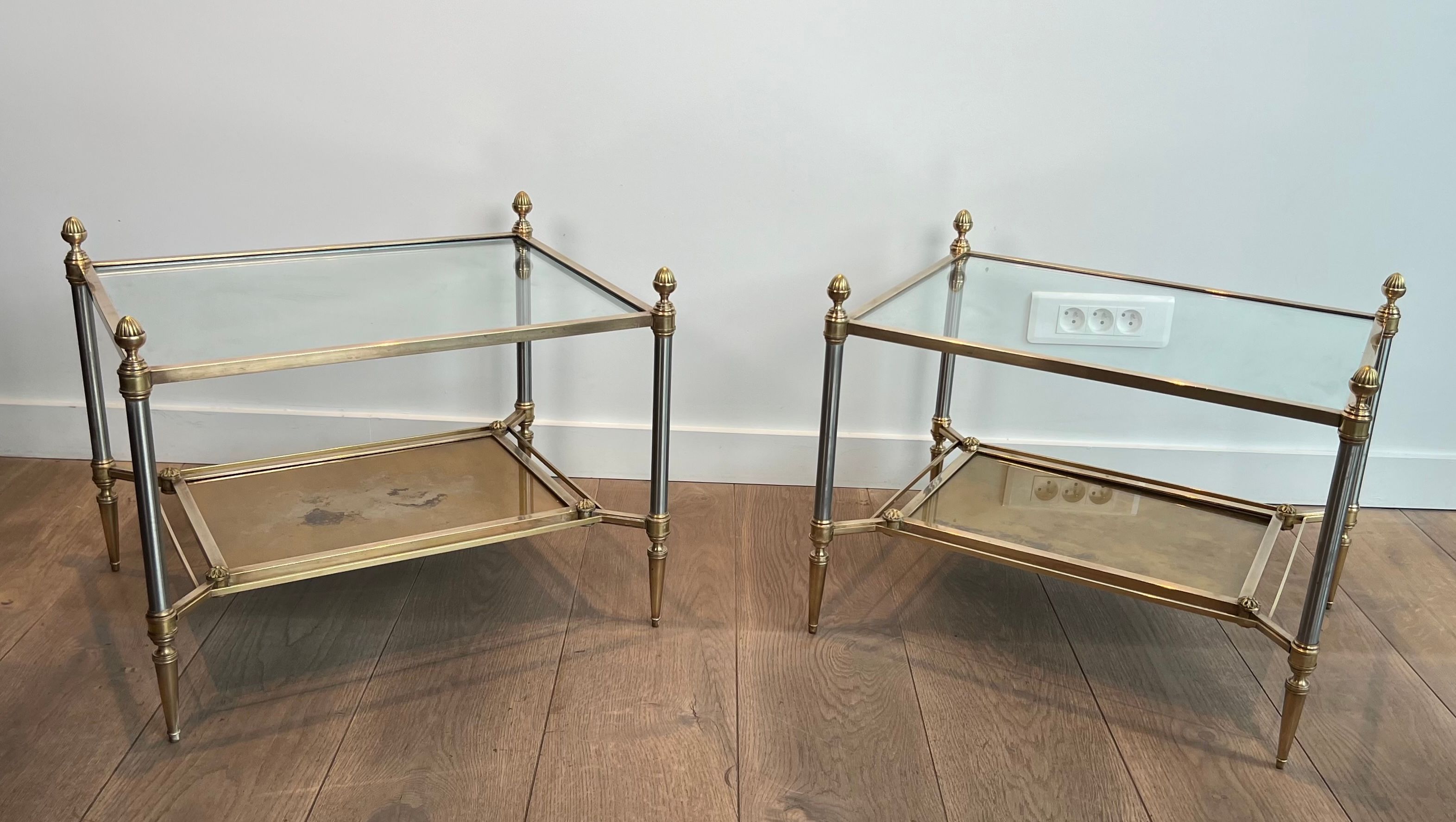 Pair of neoclassical side tables in steel and brass by Maison Jansen.
