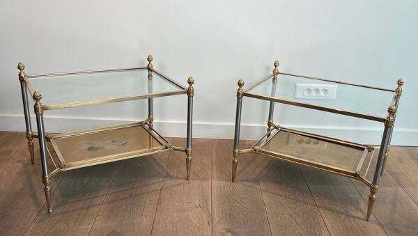 Paire de bouts de canapé de style néoclassique en acier et laiton de la Maison Jansen