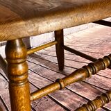 Wooden armchair with high back