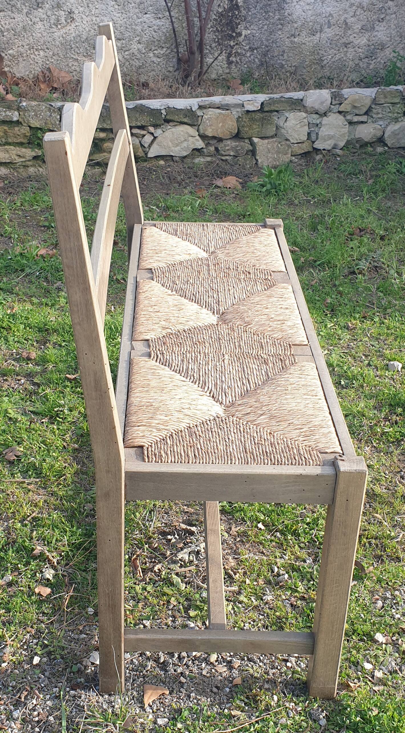 Wooden bench with vintage straw seating