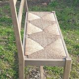Wooden bench with vintage straw seating