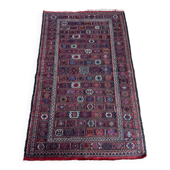 Old handmade Afghan rug