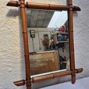 Vintage wooden mirror imitating bamboo