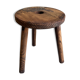 Three-legged wooden stool