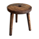 Three-legged wooden stool