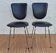 Black faux leather chairs
