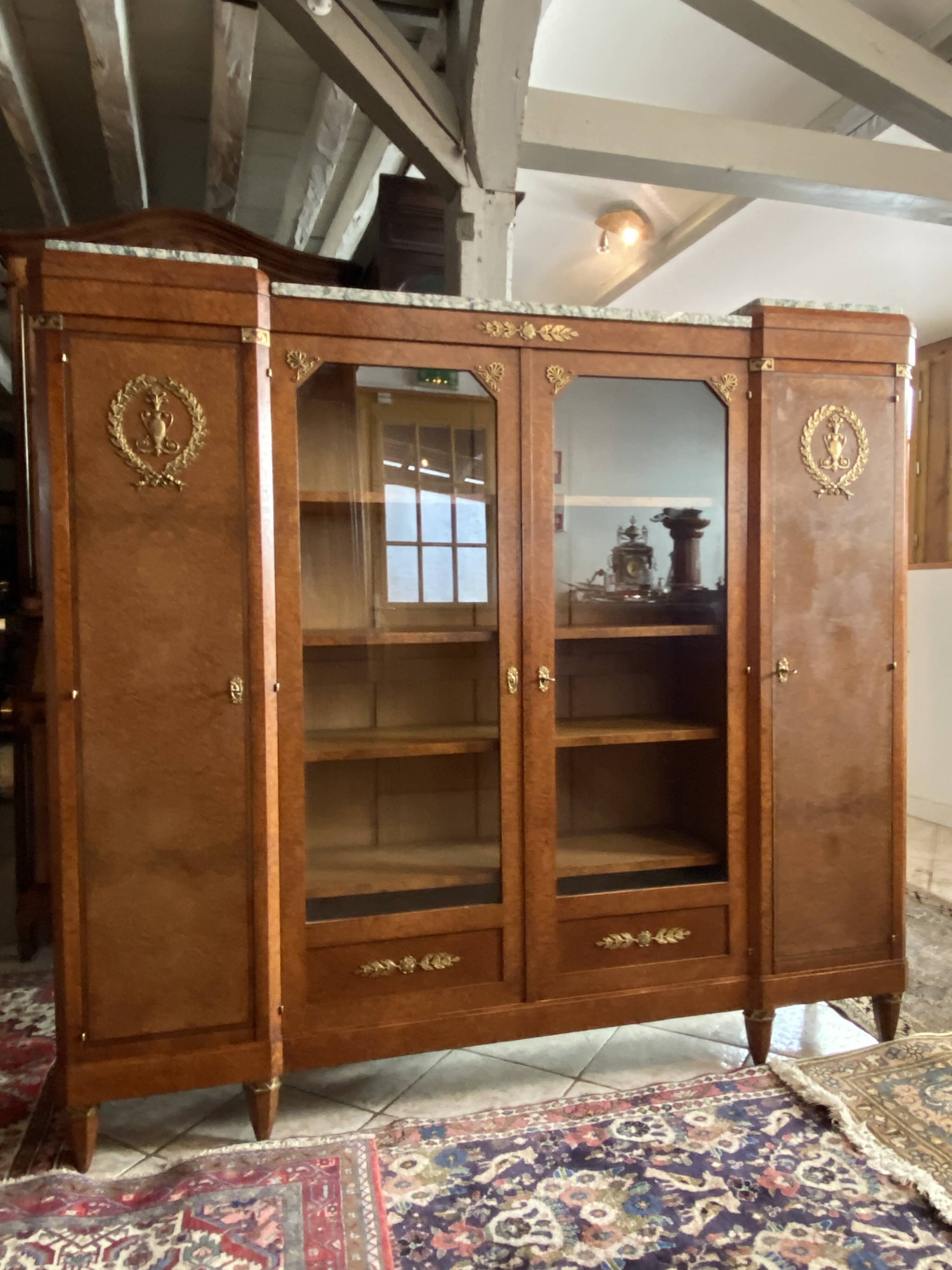 Showcase library in Neoclassical style, 1930, walnut burl and bronze.