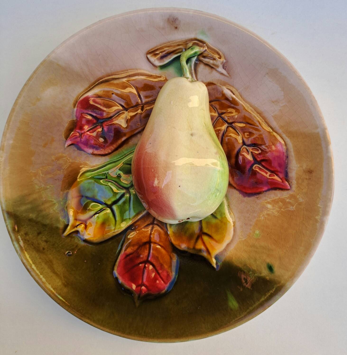 Pear slip plate in relief