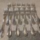 12 silver-plated metal cake forks by Argental silversmiths with a decorative pattern