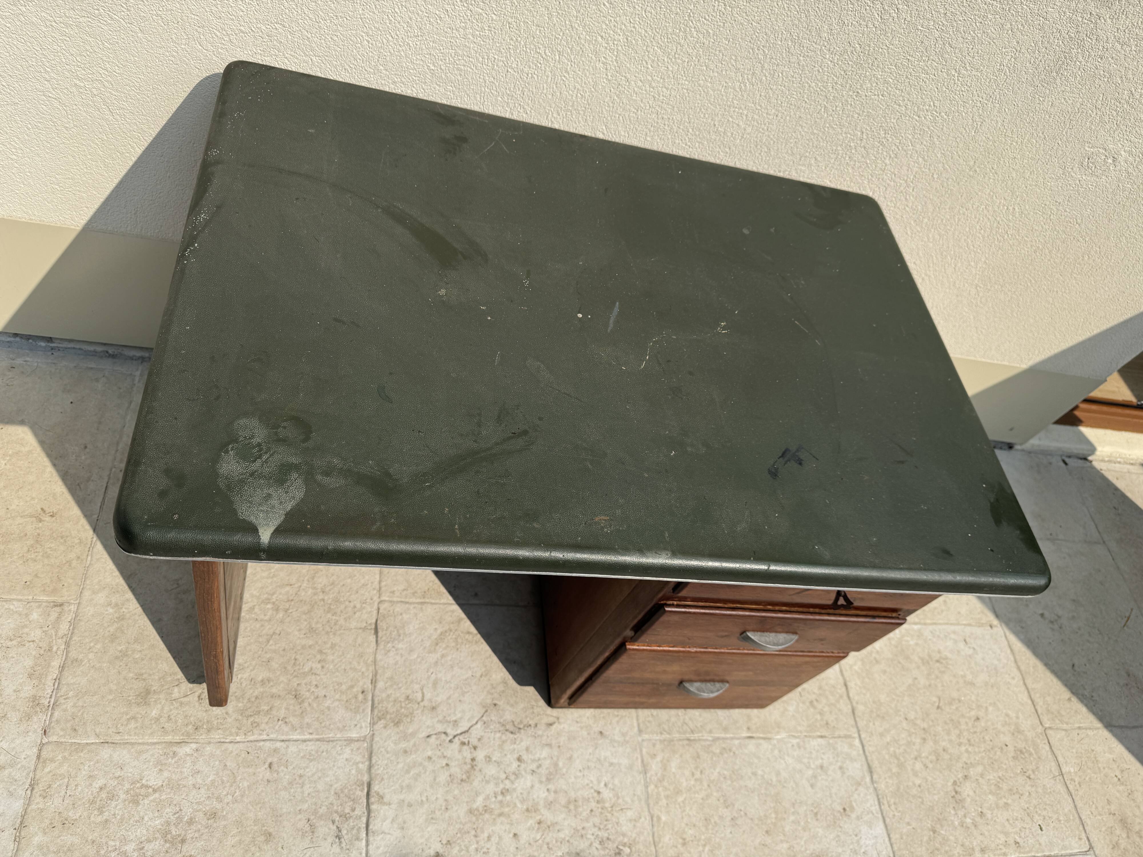 Modernist desk in wood and green moleskin upholstery
