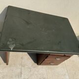 Modernist desk in wood and green moleskin upholstery