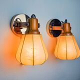 Pair of articulated "Cocoon" wall lights, resin and pine, Italy, 1970