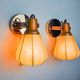 Pair of articulated "Cocoon" wall lights, resin and pine, Italy, 1970