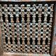 Openwork indian door in metal and blue wood