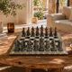 Vintage chess set in patinated metal alloy with a 39 cm chessboard from the 1980s.