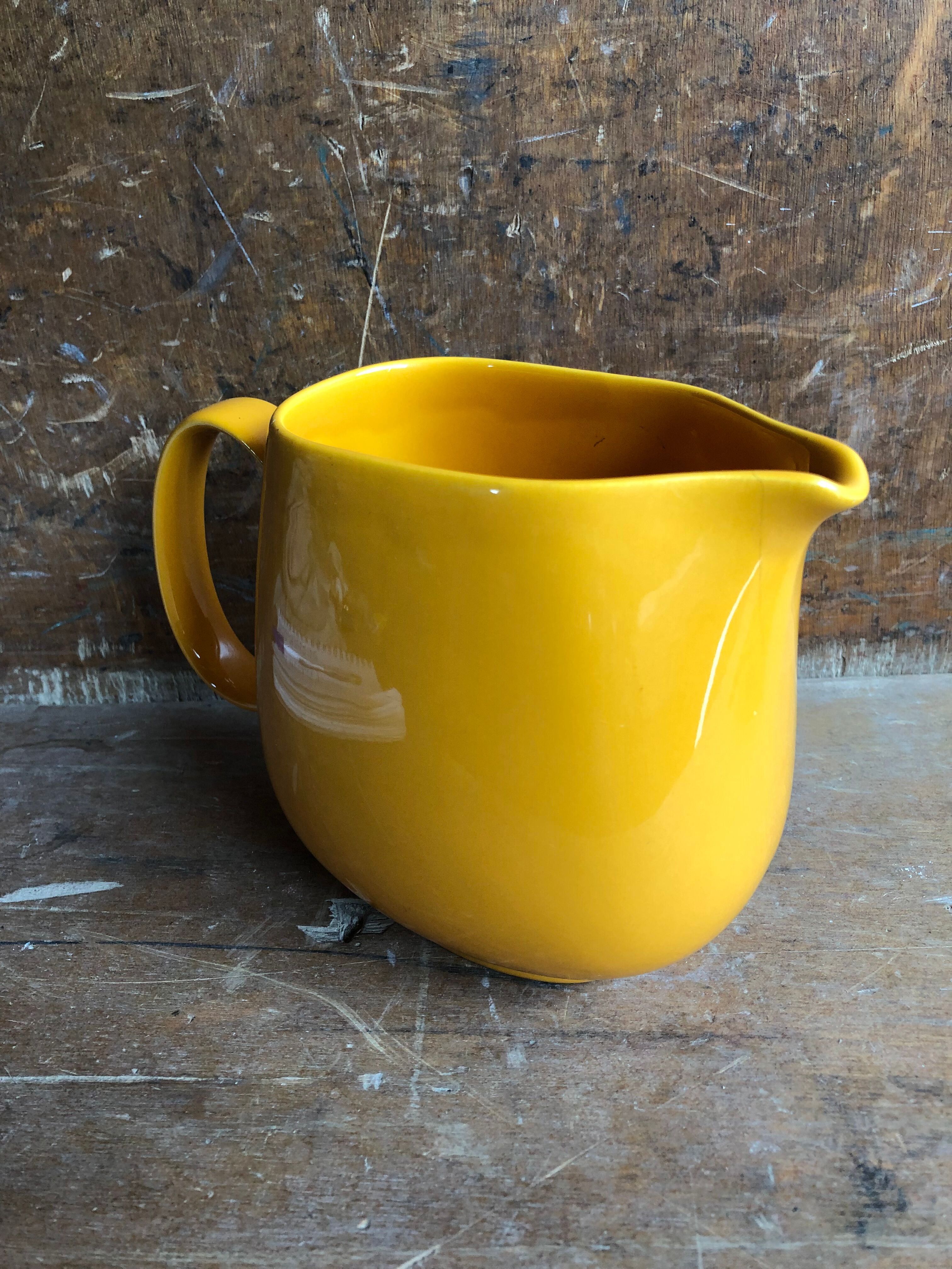 Old yellow ceramic pitcher made in germany 70s vintage