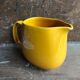 Old yellow ceramic pitcher made in germany 70s vintage