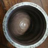 Ceramic pot decorated with bulls in relief