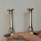Pair of mid-century silver-plated metal candleholders