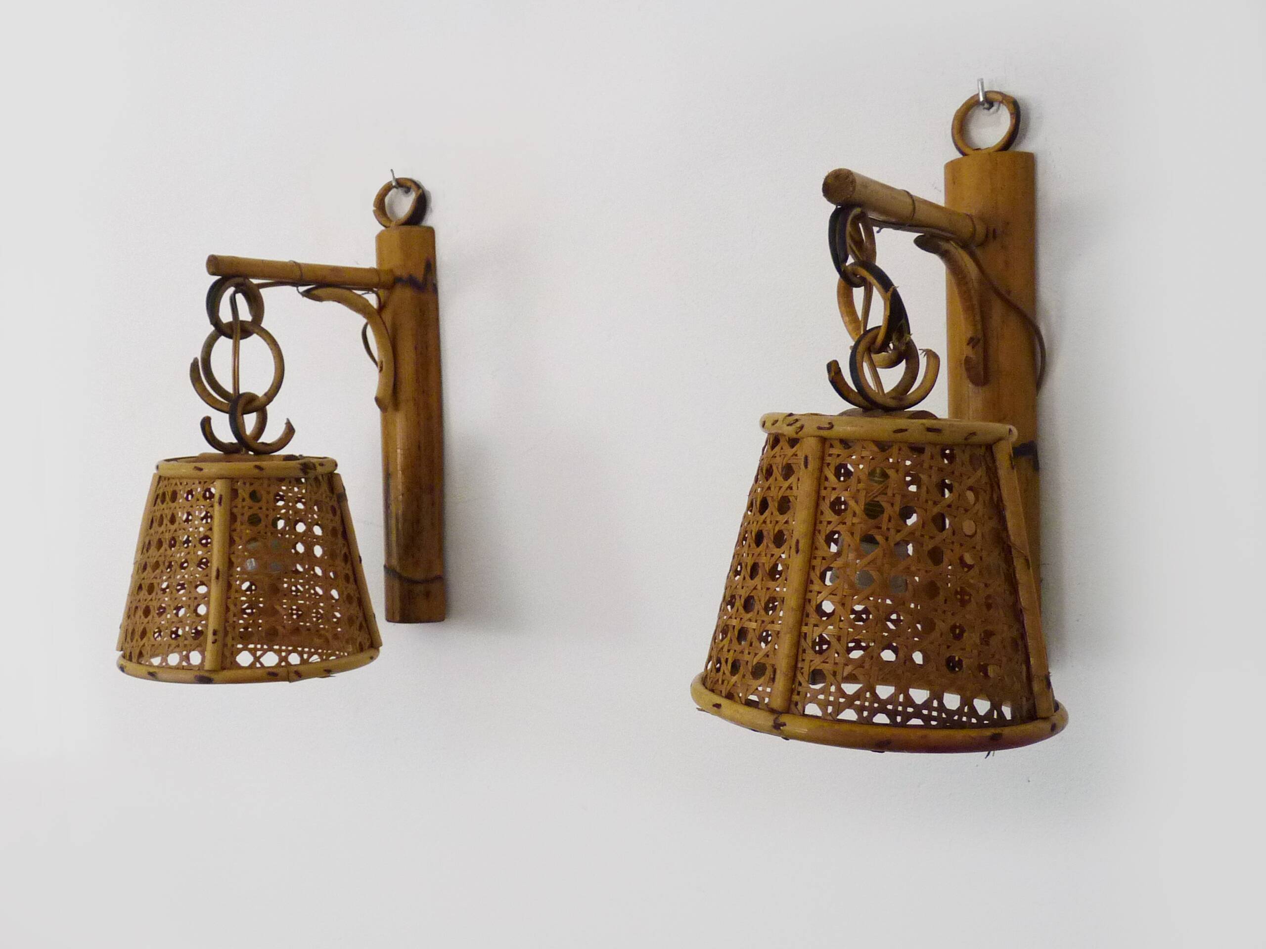 Pair of rattan and cane lantern wall lights. 1950s-1960s