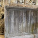 Old glazed wooden door patinated