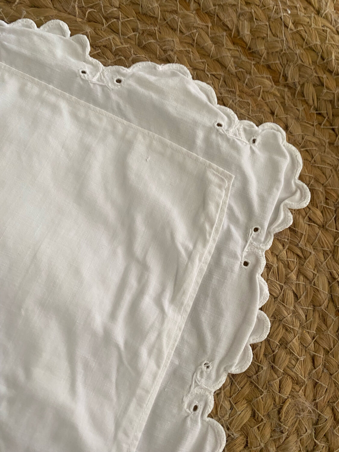 White cotton pillowcase with monogram BC.