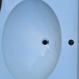 White ceramic wall washbasin with 2 ceramic legs