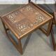 Set of 3 nesting tables in teak with tiled tops.