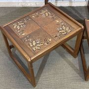 Set of 3 nesting tables in teak with tiled tops.