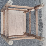 Vintage handmade wooden stool and rope