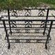 Wrought iron pot-carrying planter