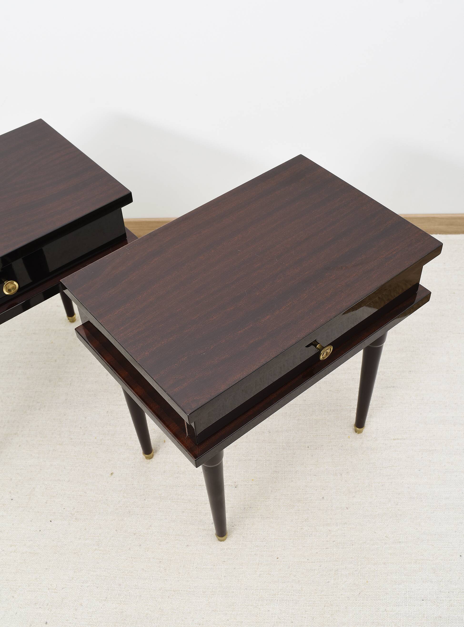 Pair of rosewood bedside tables, with drawer.