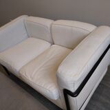 A sofa and two LC2 Cassina armchairs