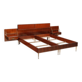 Double bed from the 1960s with bedside tables by Silvio Cavatorta.