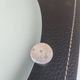 Wall light or ceiling light in frosted glass and leather-like material.
