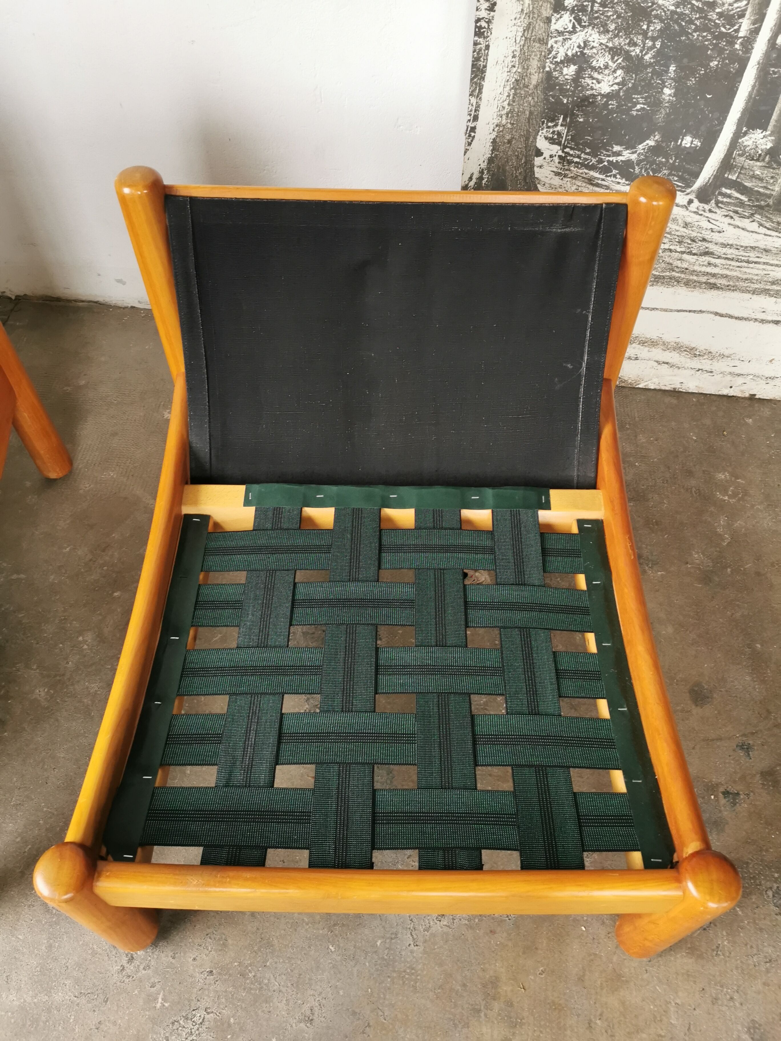 Pair of designer leather armchairs 80s