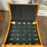 Pair of designer leather armchairs 80s