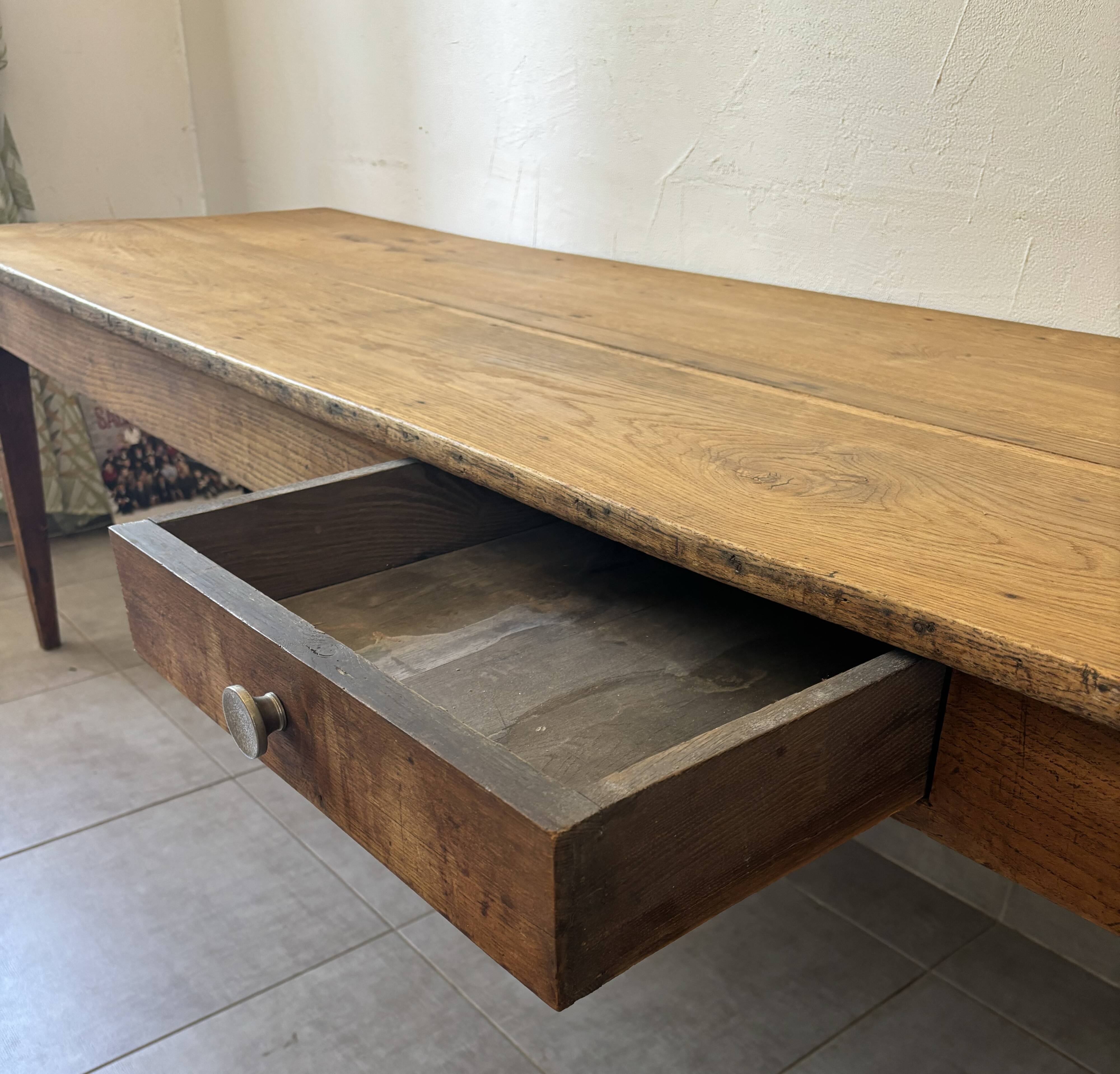 Authentic vintage farmhouse table from the 1950s in solid oak.