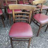 Set of 4 bistro chairs in curved wood and vintage red skai seats.