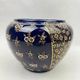 Limoges porcelain flowerpot with gold enamel decoration and blue relief flowers from Four