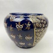 Limoges porcelain flowerpot with gold enamel decoration and blue relief flowers from Four
