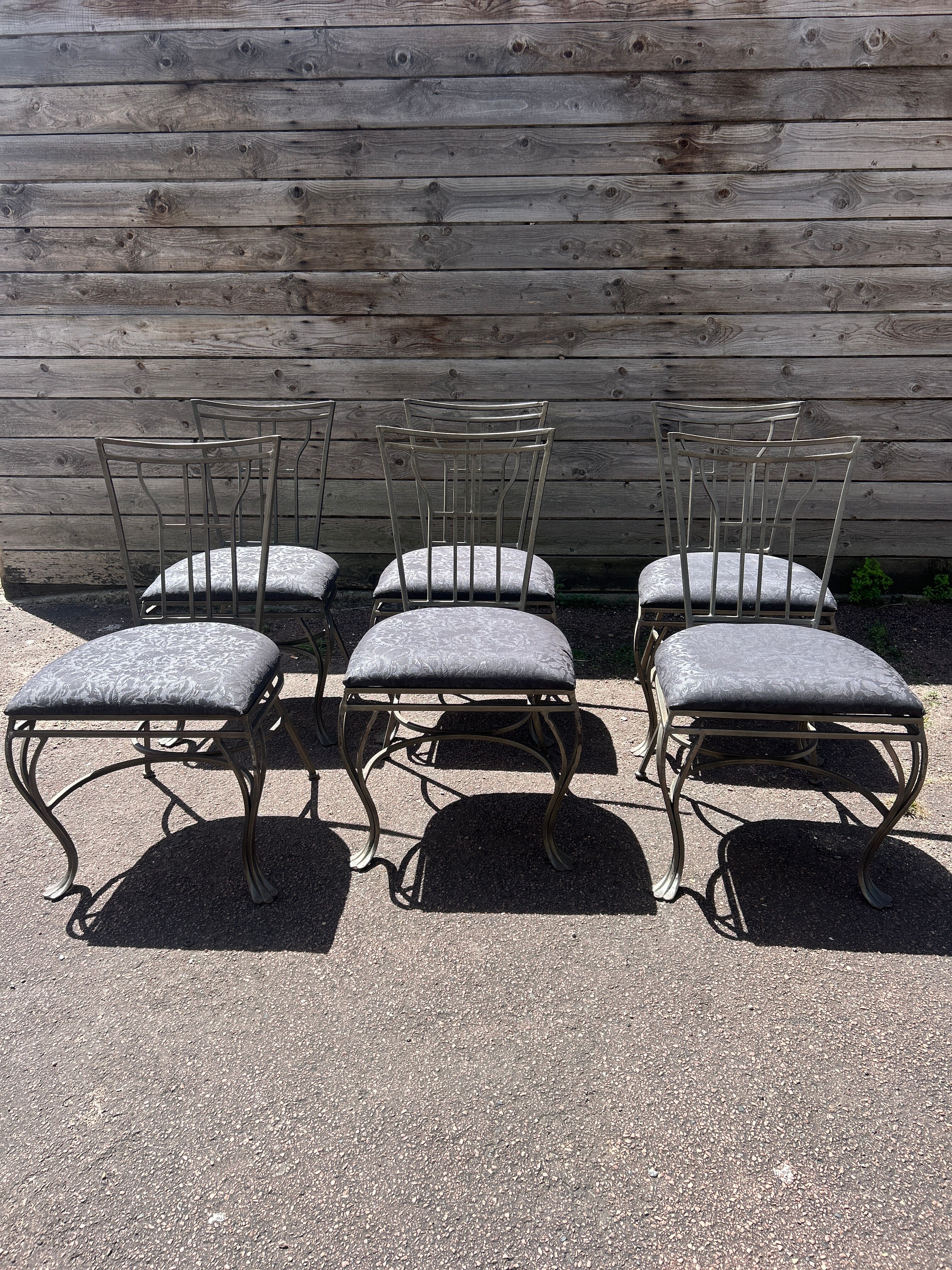 6 wrought iron chairs with fabric seats