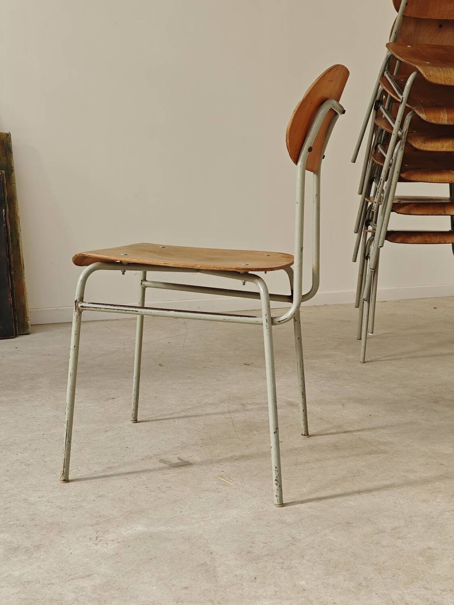 Set of 8 metal and wood school chairs  
Ex Czechoslovakia 1960